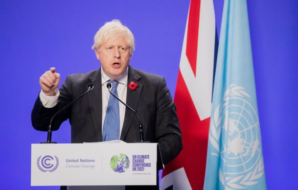 英国首相说鲍里斯•约翰逊(Boris Johnson)在新闻发布会上COP26在格拉斯哥