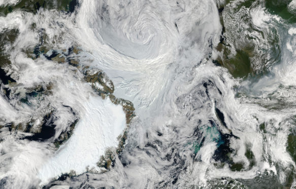 北极风暴的图像马赛克。（信誉：NASA / GODDARD / MODIS RAPING RESPORT团队）