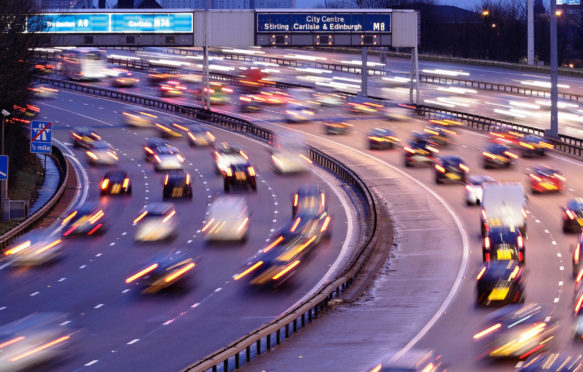 在M8高速公路的清早交通在格拉斯哥，苏格兰。信用：肯尼威廉姆森/ alamy股票照片