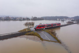 Train-passing-through-a-flooded-road-in-Germany, 2 - 2021